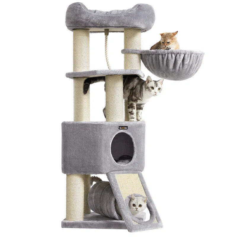 Three cats playing on a multi-level gray cat tree